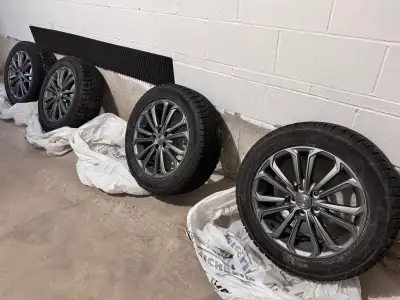 Selling a complete set of winter wheels and tires in pristine condition. I purchased these brand new...