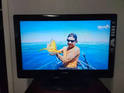 32" Polaroid TV with built-in DVD player. Please note that the DVD player is not working and there i...