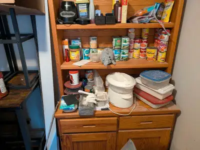 The items on the Hutch are not included! This is a 2 piece Hutch that is easily transported.