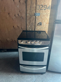 Almost NEW ge "24" apartment size stainless steel stove 