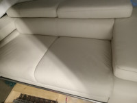 White Modern Leather and Chrome Sofa for sale. Clean. No smells.
