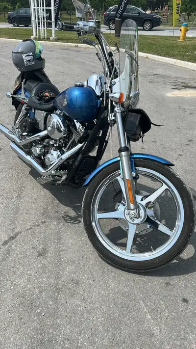 This is the best kept and dealer maintained, fuel-injected Dyna Wide Glide on the market. I am the s...