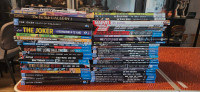 Over 50 comic book paperbacks. Good condition