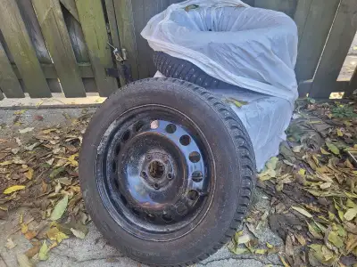 Set of 4 Studded (can be removed) winter tires on rims (205/55 R16). Tires are in good condition, pr...