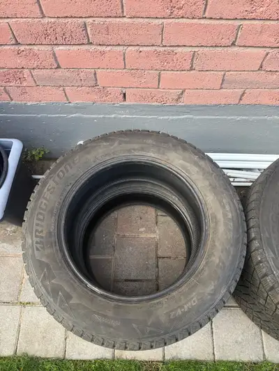 Selling a set of 225 65 17 Bridgestone Blizzak Winter Tires. Tires still have plenty of tread left a...
