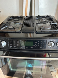 Propane stove with electric convection oven 