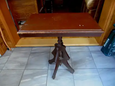 Antique solid wood side table that needs to be stripped. No broken pieces. The size is 24 inch long,...