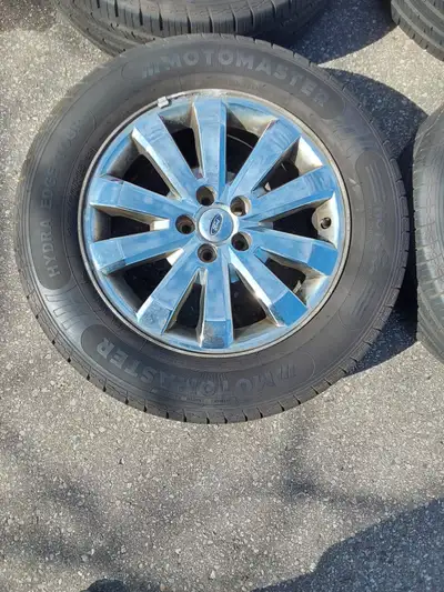 These 18" Motomaster HYDRA EDGD TOUR all-season tires are on OEM aluminum rims with 5X114.3mm patter...