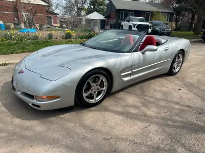 Car is a blast, silver on red leather. All original other than a hurst shift knob and a set of weath...