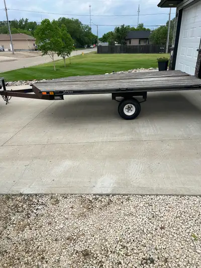 2006 Rainbow sled/ATV trailer. New LED lights and wiring. Tires good, has spare(not shown). Repacked...