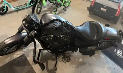 2016 Harley sportster iron 883 . Matt black and gunmetal grey in color . Shark road slip on exhaust,...