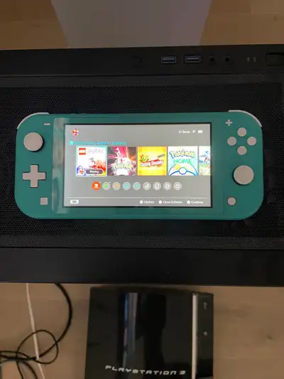 * Colour: Turquoise * Model: Nintendo Switch Lite * Includes: Case Bought as a gift, lightly used