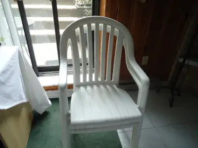 TWO WHITE PLASTIC CHAIRS FOR OUTDOORS. VERY COMFORTABLE AND CLEAN. FOR SALE $25.00 FOR BOTH PLEASE C...