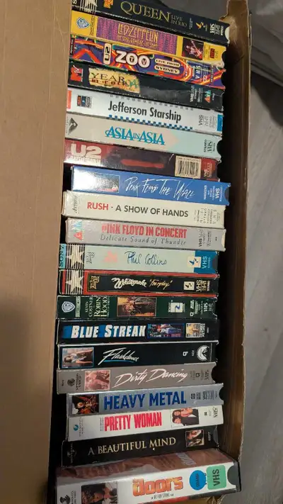 20 movies and concerts... and about 40 blank unrecorded VHS *Will swap for reptile accessories or mu...