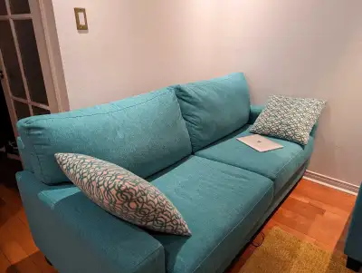 Almost new teal sofa