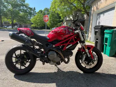 Selling my wife’s 2012 Ducati Monster 796 featuring a bespoke red and black artistic graphic paint j...