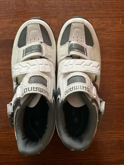 Essentially new Shimano bike shoes compatible with 2 bolt Shimano cleats. Size 36. Used for a few sp...