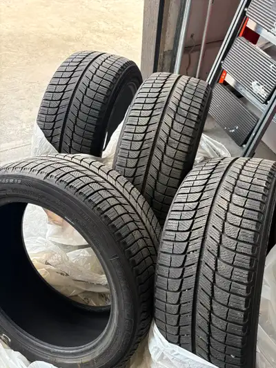 Premium Michel Ice Tires 245 45 R19 very quiet tires with plenty of thread - used on our second car...
