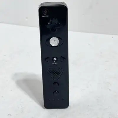 I'm selling a used black Nintendo Wii Remote. This controller is fully functional and ready for gami...