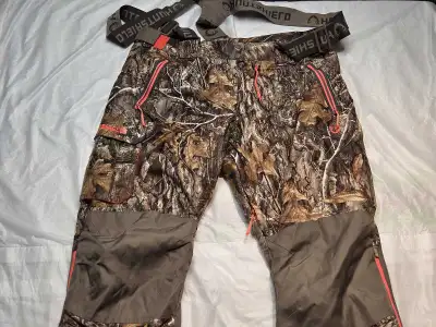 These Huntshield hunting overalls are perfect for staying warm and concealed during your outdoor adv...