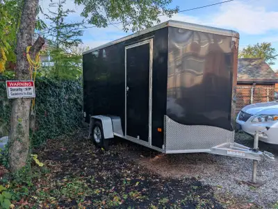 Nearly new awesome trailer. Premium Neo brand. Not your typical 6x12. Used for storage only. Driven...