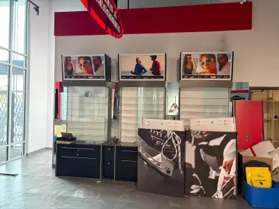 Three display cases $300 each Three metal storage cabinets $500 each Lockers $450 Located at Tamarac...