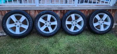Selling all seasons tire with original mazda alloy rim 215/60 R17 it is very good condition asking f...