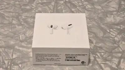 Apple Air Pods Pro. New, open box. Lightning cable and ear peices accounted for. Got them as a gift,...