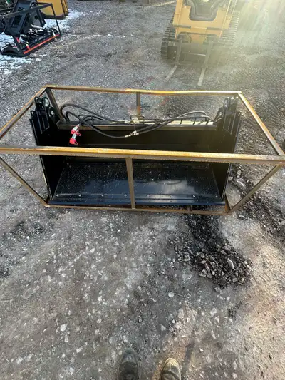Up for sale is a 4 in 1 skid steer bucket. It measures 72” in width and has a skid steer quick attac...
