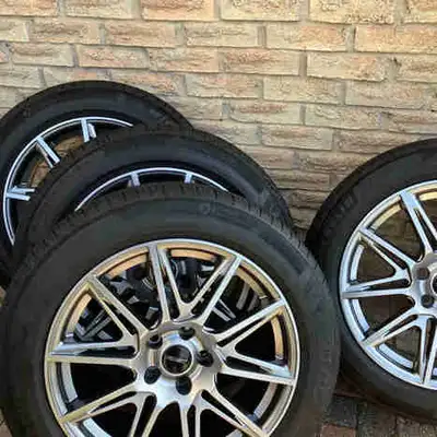 Set of 4 All Season MICHELIN PRIMACY TOUR A/S Tires on aftermarket TITANIUM wheels Tire size 255/55/...