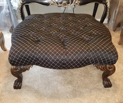 This is a stunning ottoman! The legs are incredible in their design detail and so is the true French...
