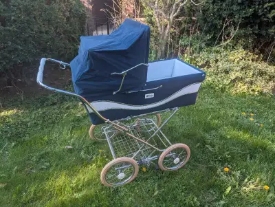 Peg Perego stroller. Vintage. Works great. Has bedding as well and cover.
