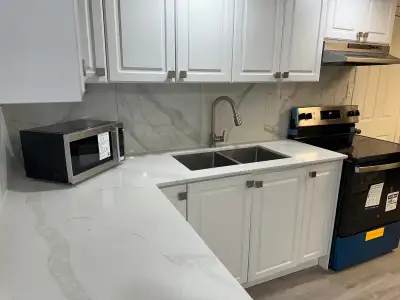 Keele Street and Eglinton Avenue West. Fully renovated, one bedroom walk out basement apartment. Wal...