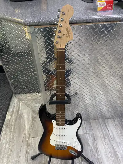 Squire Strat Electric Guitar We do offer a 30 day warranty and can test before you buy it. Item # 19...