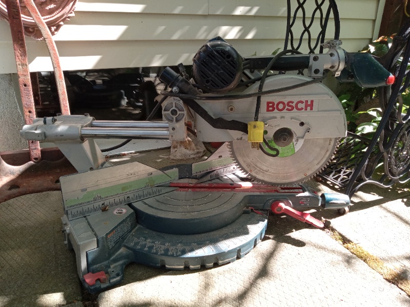 12" Bosch... radial arm chop saw with new blade , 500 Power Tools