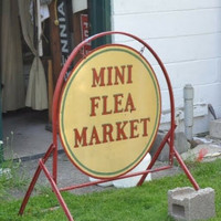 Flea Market Sign: Stolen. Please read.