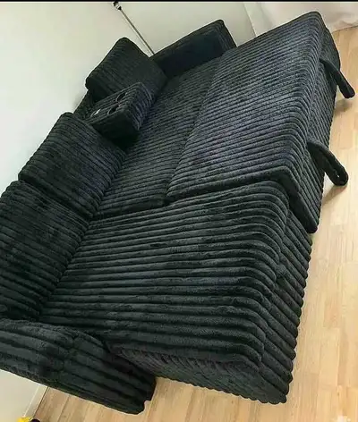 Transform your living space with this stylish black corduroy L-shaped sleeper sofa bed, perfect for...