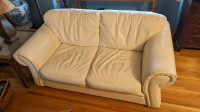 Pair of White Leather Love Seats