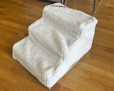2 plastic Steps with covers steps are 6 inches deep total height 12 inches length is 18 inches width...