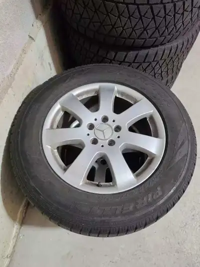 a set of OEM Mercedes-Benz 17” Wheels with Winter Tires Original factory Mercedes-Benz wheels and wi...