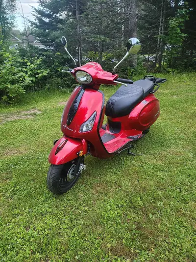 Scooter is in perfect shape. Comes with 80cc Bigbore Kit. This Scooter does not require a motor cycl...