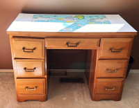 Desk with seven drawers and world map on top