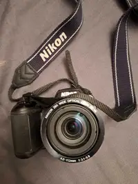 Nikon Coolpix L340 digital camera with case.
