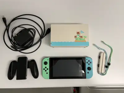 Limited Edition Nintendo Switch Animal Crossing Including all accessories shown in photo. Optional 1...