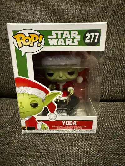 I am selling a Funko Pop! Star Wars Yoda #277, a delightful bobble-head figure for collectors and St...