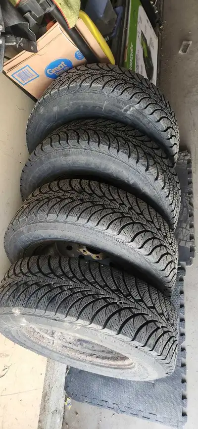 235 70 16 winter tires and rims. Off Jeep Cheerokee. Good shape. No leaks or holes . Some rustin on...