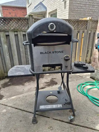 In great condition. Used a few times. Comes with stone pizza base. Pickup in bolton