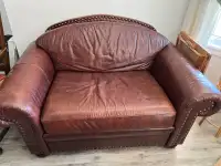 Leather love seat and ottoman