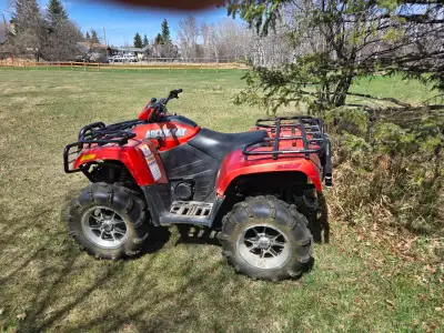 Quad, need electrical repair (suspect ecm), trailer in great condition, great rubber.