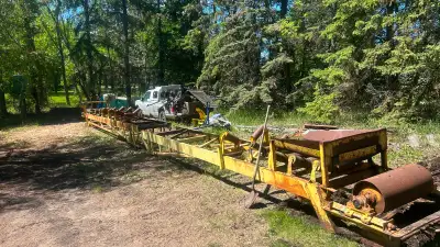 The converyor is in two pieces I had to move it with trailer. Missing a few rollers and some minor w...